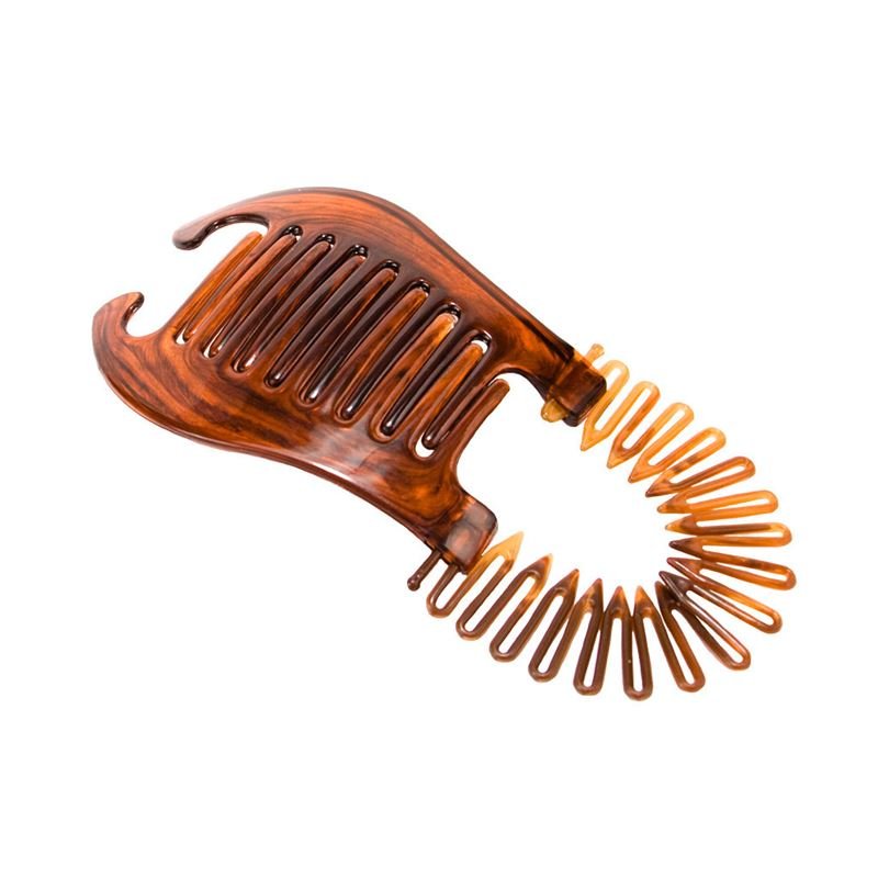 The SOHO Banana Interlocking Hair Claw - tortoise is a plastic, flexible hair tool with interlocking teeth and a curved design, ideal for retro hairstyles and securing ponytails or updos.