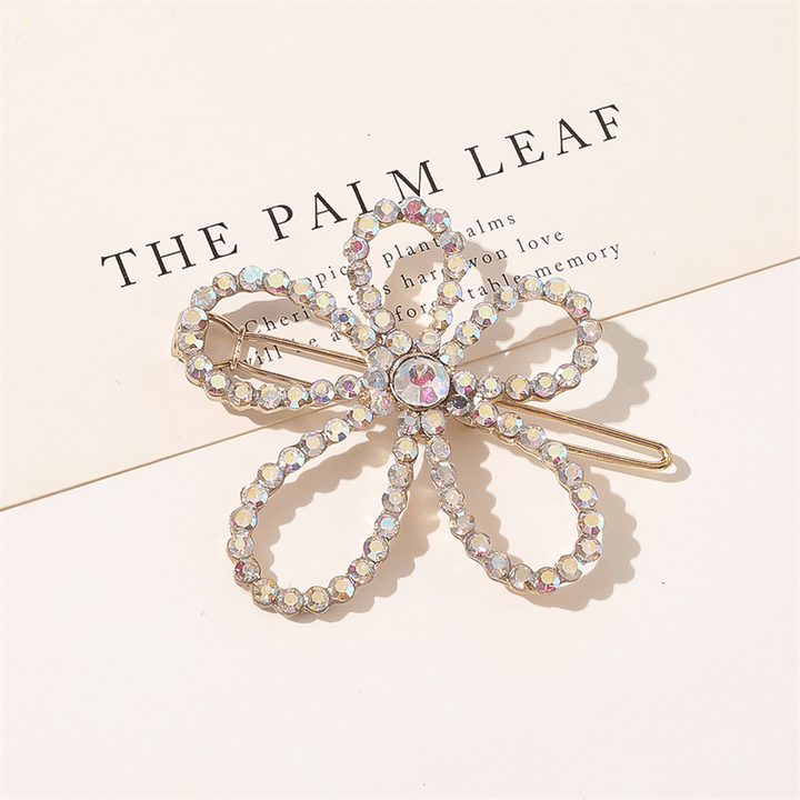 Chris Rubin Evie Hair Claw Gold - Flower - Hair Accessories | Fashiongirl