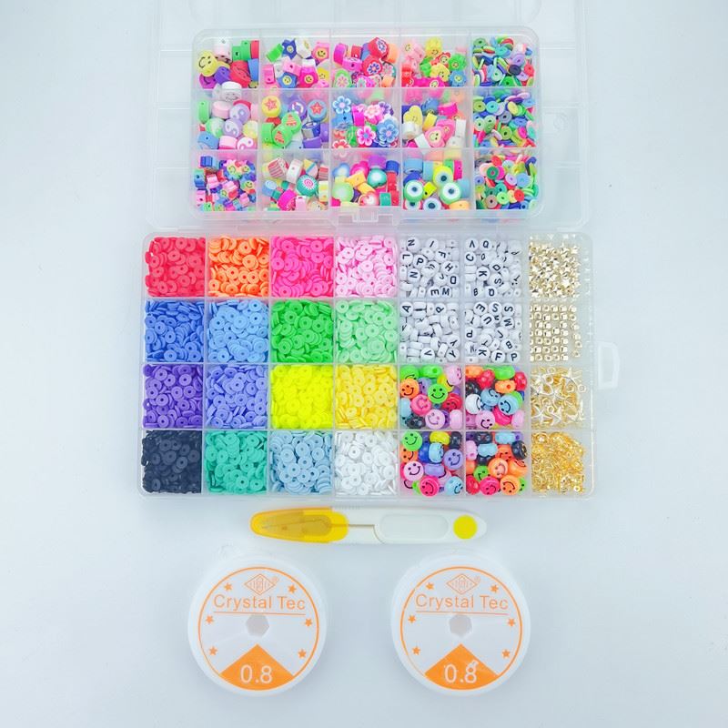 The Fashiongirl Clay Beads / Heishi Beads Fimo Kit - KREA DIY Jewellery Kit includes 4500 colorful beads in various shapes and letters, two Crystal Tec elastic strings, and yellow tweezers, arranged on a white background.