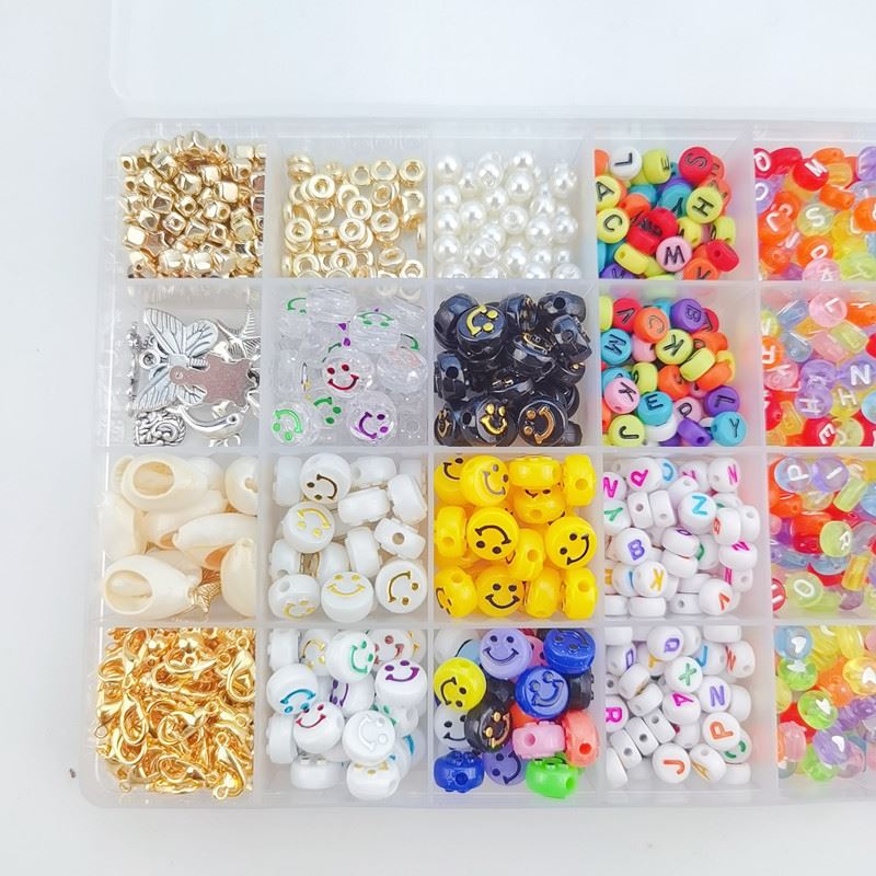 The Fashiongirl Clay Beads / Heishi Beads Merkki Kit - KREA DIY Jewellery Kit includes 7000 colourful beads—metallic, pearl, clear, letter, smiley face, heart-shaped and more—in a plastic organizer box for jewellery making.