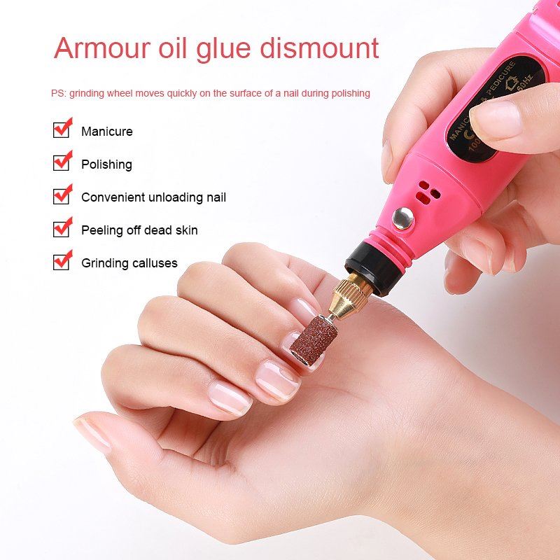 The Fashiongirl Electric Nail File 6-in-1 Manicure Set in pink is shown being used on fingernails, with uses including manicure, polishing, nail removal, dead skin peeling, and callus grinding.