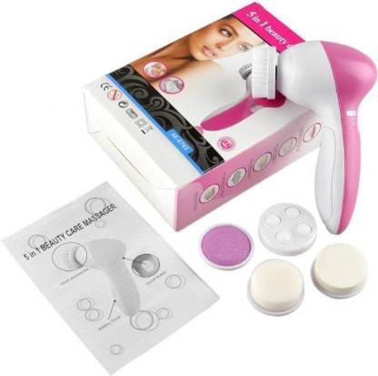 The Fashiongirl Facial Brush 5-in-1 | Facial Brush Cleanser includes pink and white handheld massager, five detachable heads, user manual, and feature-displaying box with a womans face—perfect for upgrading your skincare routine.