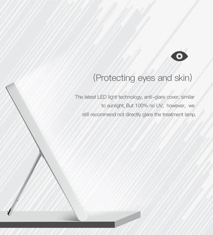 A side view of the Fashiongirl Light Therapy Lamp 10,000 lux LED on a stand highlights its anti-glare cover that protects eyes and skin—avoid direct glare for safety. An eye icon sits above text about simulating daylight and light therapy benefits.