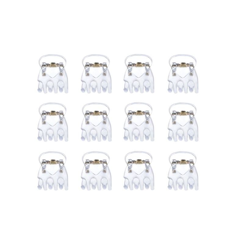Ten SOHO Lucca Mini Hair Claws - Transparent by SOHO are arranged in four rows on a plain white background, resembling orthodontic braces with white brackets and metallic wires or neatly laid-out transparent hair clips.