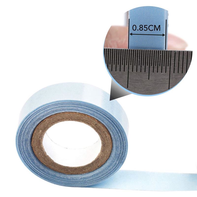 A roll of Fashiongirl Strong Double Sided Tape for Hair Extension (2.7m) is unspooled, with an inset showing the tape’s width measured at 0.85 cm using a ruler.