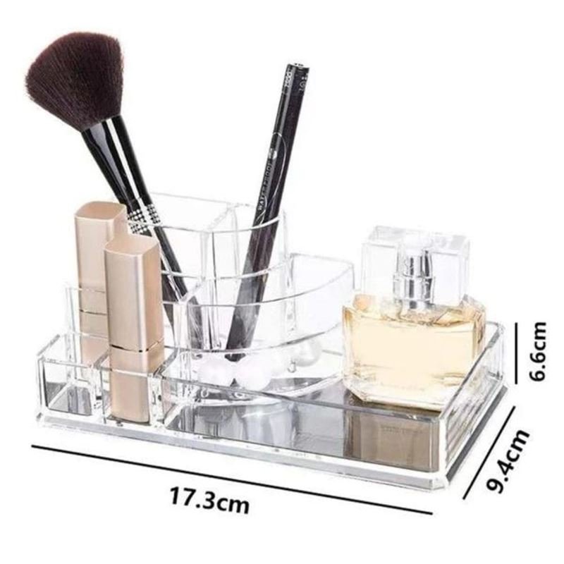 The UNIQ Acrylic Make Up Organiser 8 compartments (ctn 07) by UNIQ neatly stores brushes, lipsticks, pencils, and a perfume bottle. Sized at 17.3 x 9.4 x 6.6 cm, it keeps your beauty essentials organised and easy to access.