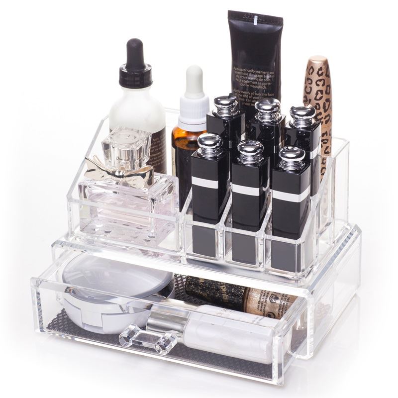 The UNIQ Makeup Acrylic Organiser with 1 drawer + top by UNIQ neatly stores perfumes, lipsticks, skincare bottles, and small beauty items, with a bottom drawer for extra storage.
