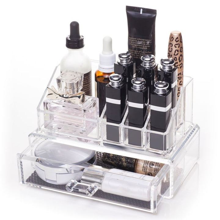 The UNIQ Makeup Acrylic Organiser with 1 drawer + top by UNIQ neatly stores perfumes, lipsticks, skincare bottles, and small beauty items, with a bottom drawer for extra storage.