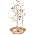The UNIQ Bronze Vintage Jewelry Tree with 3 Birds is a stainless steel organizer stand for necklaces, bracelets, and earrings, featuring a round tray base for extra storage—a charming addition to your jewelry collection.